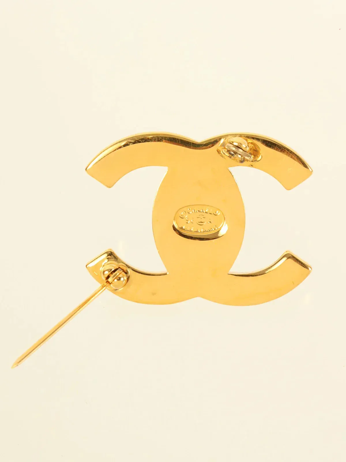 CHANEL 1996 Made Rhinestone Turn-Lock Brooch Gold